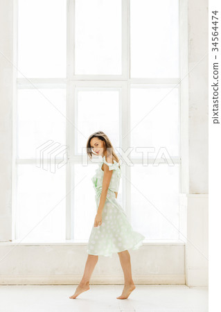 Beautiful young woman 34564474