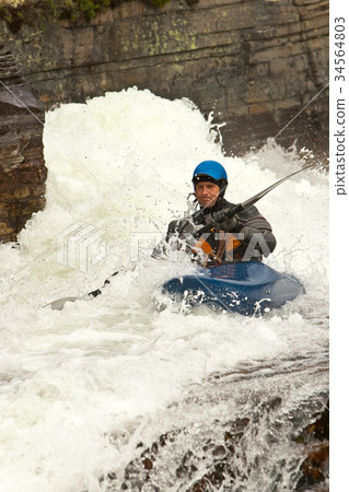 Kayaker on whitewater Kayaker on whitewater 34564803