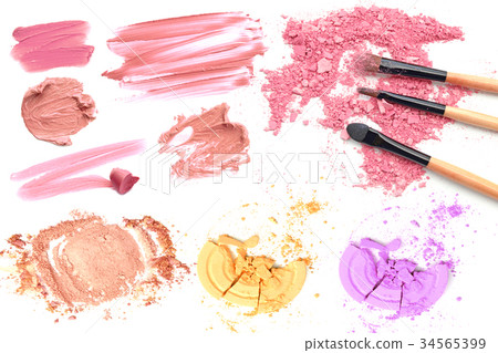 Collection of smudged lipstick and powder cosmetic 34565399