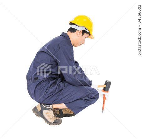 Man hold hammer and cold chisel on white Man hold hammer and cold chisel on white 34566002