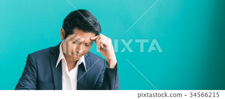 Young troubled businessman holding hands on head. Young troubled businessman holding hands on head. 34566215
