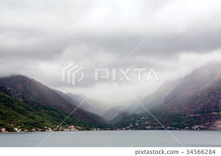 Montenegro Bay of Kotor with water and mountains Montenegro Bay of Kotor with water and mountains 34566284