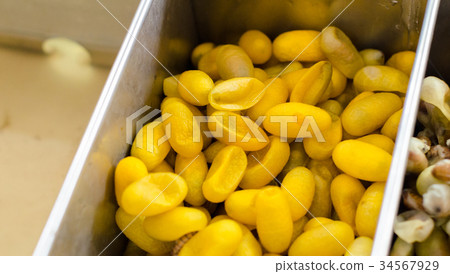 Boiling silkworm cocoon in the pot 34567929