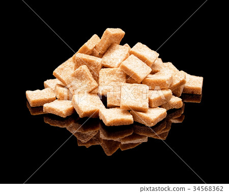 Pile of lump brown sugar Pile of lump brown sugar 34568362