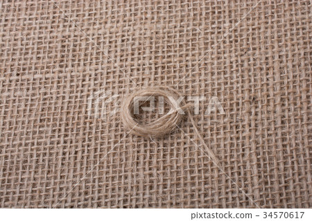 Roll of brown color linen string 34570617