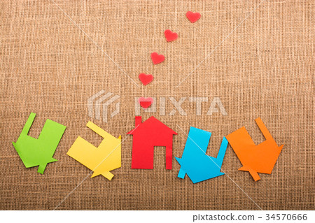 Hearts coming out of chimney of paper house Hearts coming out of chimney of paper house 34570666