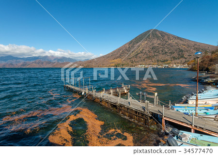 Lake Chuzenji in autumn season, Nikko, Japan. 34577470