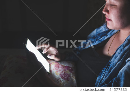 Hands using smartphone sitting on bed sleeping at Hands using smartphone sitting on bed sleeping at 34577883