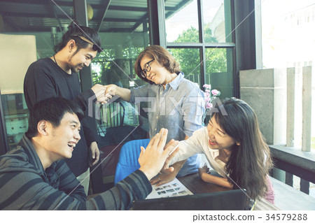asian freelance team happiness 34579288