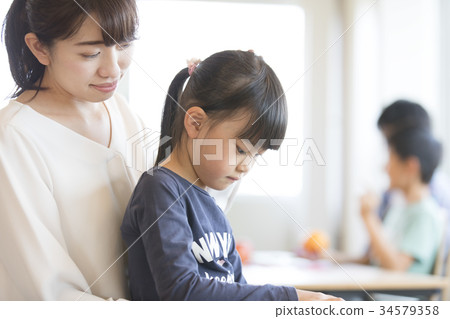 Elementary school classroom trouble 34579358