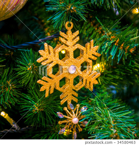 Christmas decorations on the branches of fir tree Christmas decorations on the branches of fir tree 34580463
