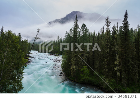 Foggy morning on a mountain river. Autumn mood Foggy morning on a mountain river. Autumn mood 34581371