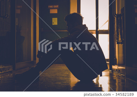 The silhouette of a businessman in sad mood. 34582189