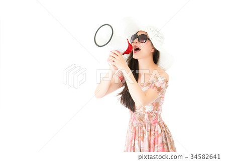 beautiful lady holding loudspeaker telling news 34582641