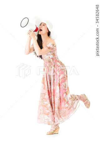 attractive beauty girl holding loudspeaker talking 34582648