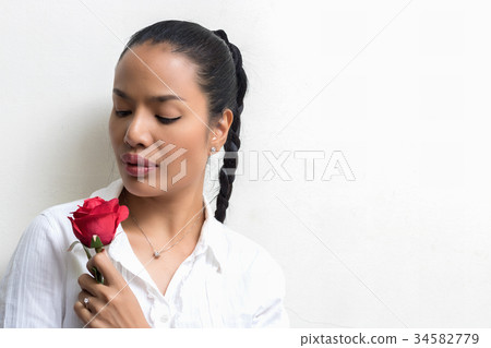 Beauty Woman with red rose Beauty Woman with red rose 34582779