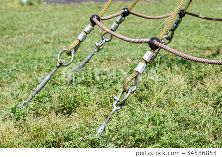 End of swinging rope hang on metal construction in 34586853
