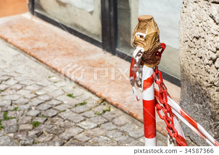 White and red baton used to define a working area 34587366