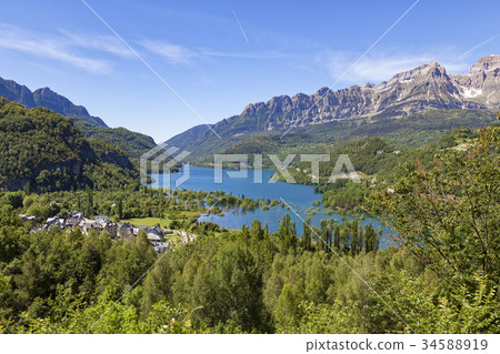 Mountain ridge and lake at the Spanish Pyrenees Mountain ridge and lake at the Spanish Pyrenees 34588919