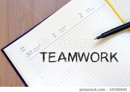 Teamwork write on notebook Teamwork write on notebook 34590948