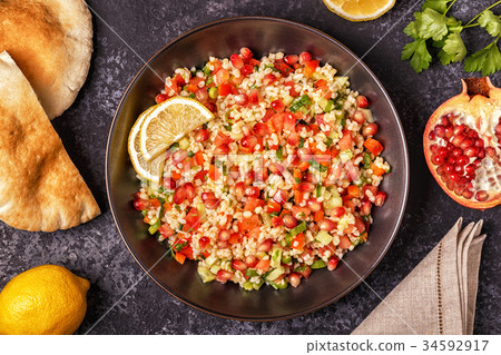 Tabbouleh salad, traditional middle eastern dish. Tabbouleh salad, traditional middle eastern dish. 34592917