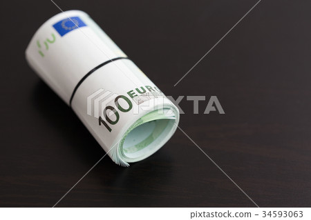 Roll of one hundred euro bills Roll of one hundred euro bills 34593063