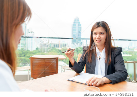 Businesswoman or manager interview her candidate Businesswoman or manager interview her candidate 34598151