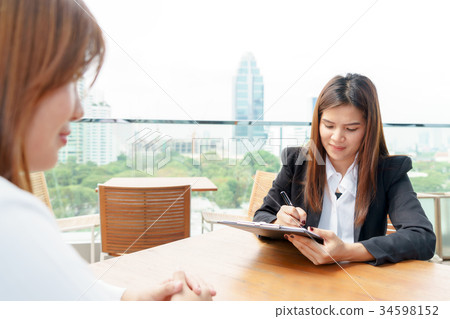 Businesswoman or manager interview her candidate 34598152