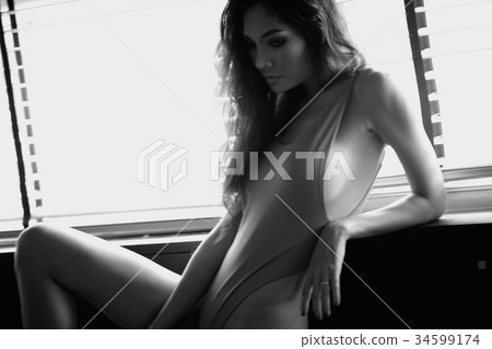Sexy woman in flirty dress with different angles. black and whit Sexy woman in flirty dress with different angles. black and whit 34599174