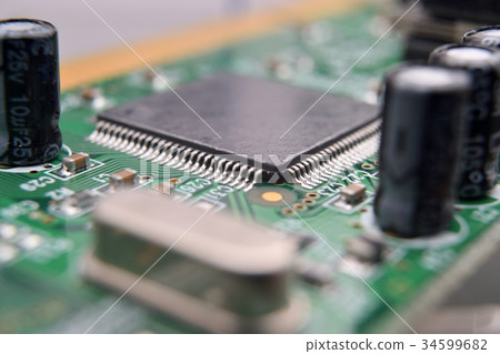 close up of electronic components on pcb board close up of electronic components on pcb board 34599682