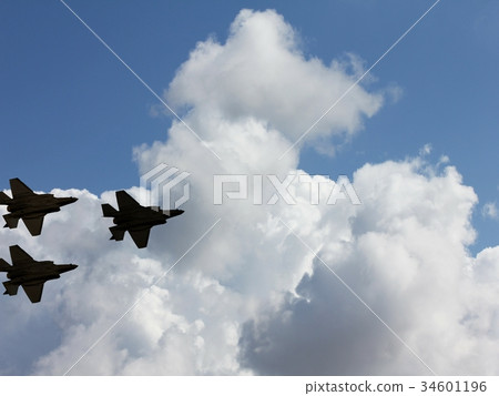 Silhouettes of three F-35 aircraft Silhouettes of three F-35 aircraft 34601196