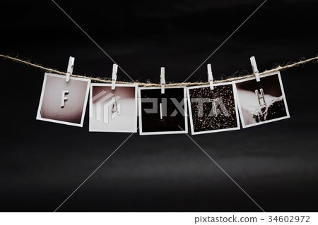 Rows of FAITH letters photo frames hanging Rows of FAITH letters photo frames hanging 34602972