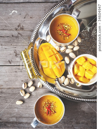 Mango lassi Indian drink 34604947