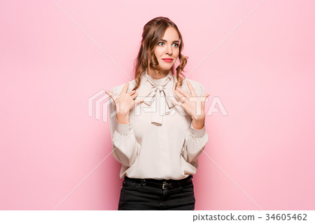 Surprised happy beautiful woman looking in Surprised happy beautiful woman looking in 34605462