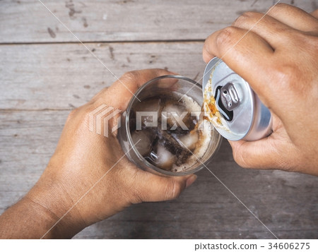 Pouring cola drink 34606275