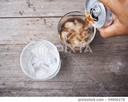 Pouring cola drink 34606276