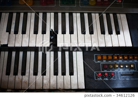 Old retro unnecessary faulty musical synthesizer 34612126