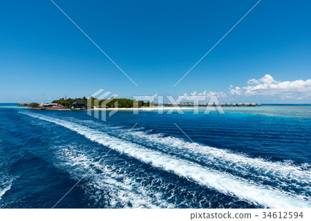 Maldives sea and sky and wake 34612594