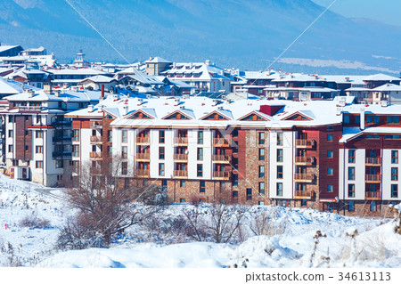 Houses and snow mountains in Bansko, Bulgaria Houses and snow mountains in Bansko, Bulgaria 34613113