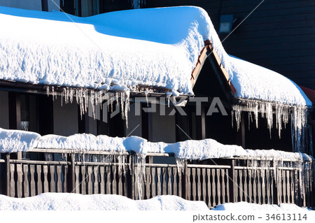 Winter or spring background with bright icicles Winter or spring background with bright icicles 34613114