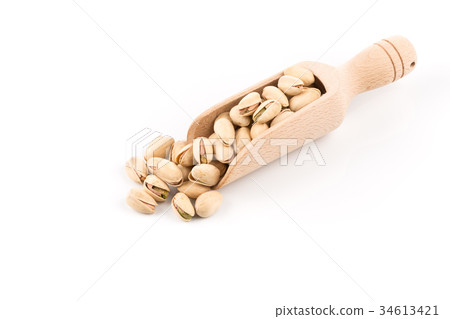 pistachio nut on white pistachio nut on white 34613421