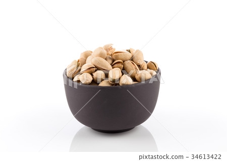 pistachio nut on white 34613422