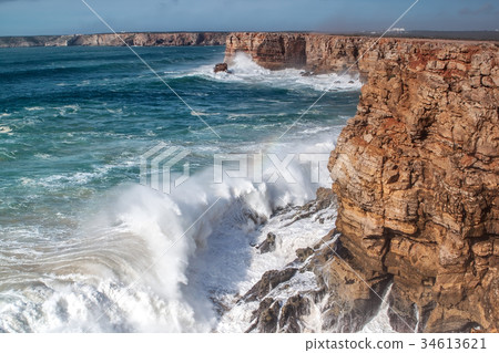 Giant waves hit the rocks, during a storm. Giant waves hit the rocks, during a storm. 34613621