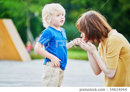 Mother Comforting Her Son Stock Photo 34614044 Pixta