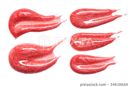 Set of different lip glosses smear isolated on white. Smudged makeup product sample. 34616684