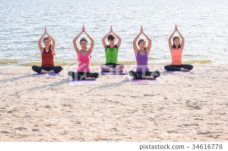 Yoga class ,Group of people doing tree 34616778