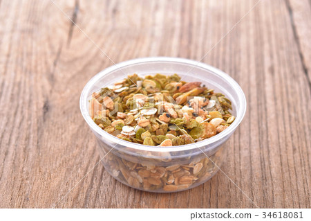 Cereal in bowl on table Cereal in bowl on table 34618081