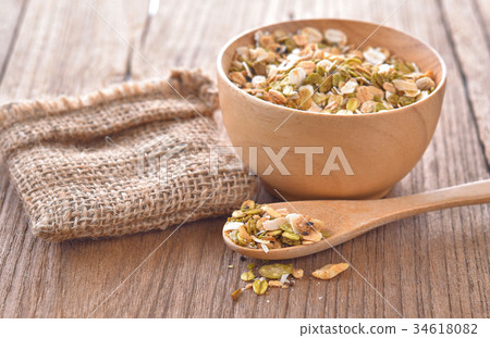 Cereal in bowl on table Cereal in bowl on table 34618082