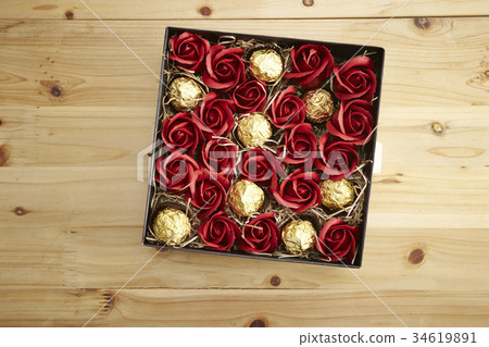 Artificial flower rose flower box and chocolate Artificial flower rose flower box and chocolate 34619891