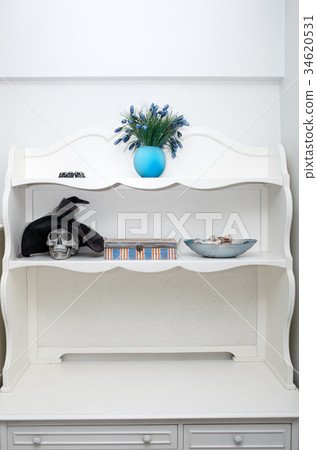 Human skull in a white cabinet. Halloween theme 34620531